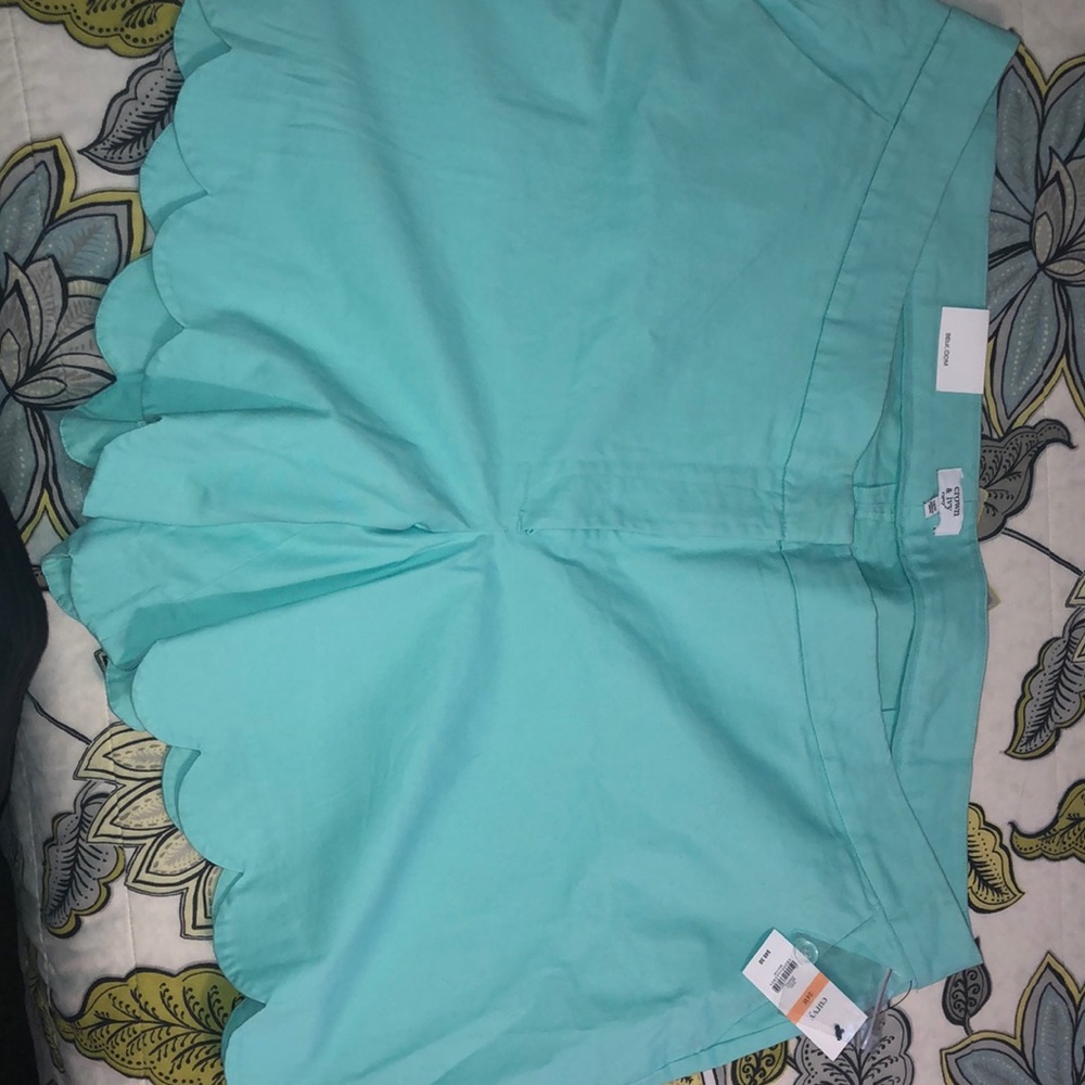 Scallop leg teal shorts